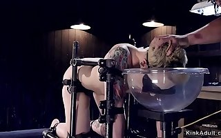 Impolite haired blonde in machinery bondage